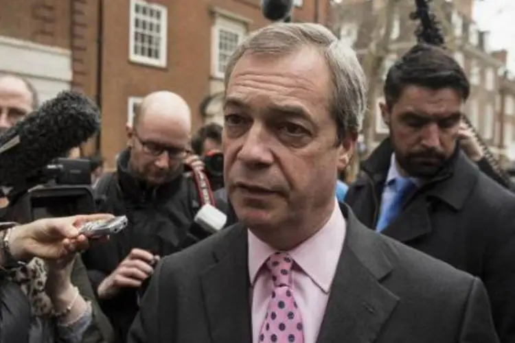 O líder do partido antieuropeu e anti-imigração britânico UKIP, Nigel Farage: "Nós não poderemos controlar quem chega ao Reino Unido enquanto formos membros da UE, porque permite a livre circulação de seus cidadãos" (Niklas Hallen/AFP/AFP)