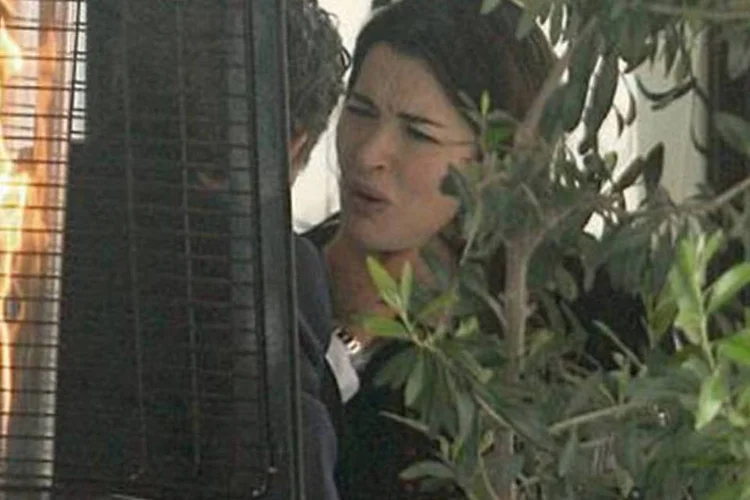 
	Fotos mostram Nigella em l&aacute;grimas e levaram Saatchi a receber uma advert&ecirc;ncia da pol&iacute;cia por agress&atilde;o
 (Reprodução)