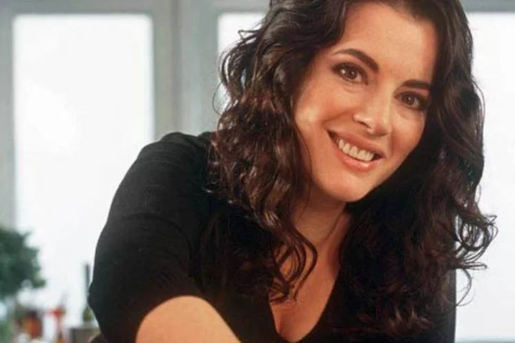 
	Nigella Lawson lan&ccedil;ou o livro&nbsp;&ldquo;Na Cozinha com Nigella &ndash; Receitas do Cora&ccedil;&atilde;o da Casa&rdquo; (editora Best Seller)
 (Divulgação)
