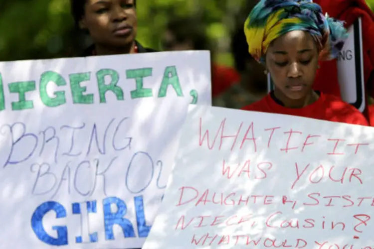 
	Protestam contra Boko Haram: grupo assumiu sequestro de mais de 200 estudantes em abril
 (REUTERS/Gary Cameron)