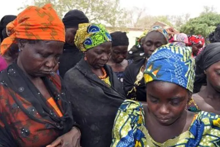 
	Parentes de jovens sequestradas pelo Boko Haram: cinquenta e sete delas conseguiram escapar, mas o destino de 219 outras permanece incerto
 (AFP)