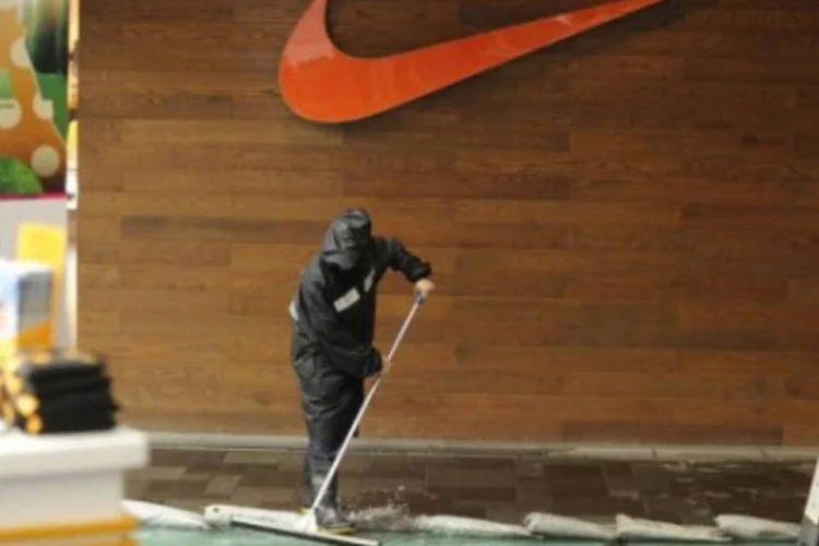 A Nike patrocina a Super League, o campeonato nacional chinês  (Peter Parks/AFP)