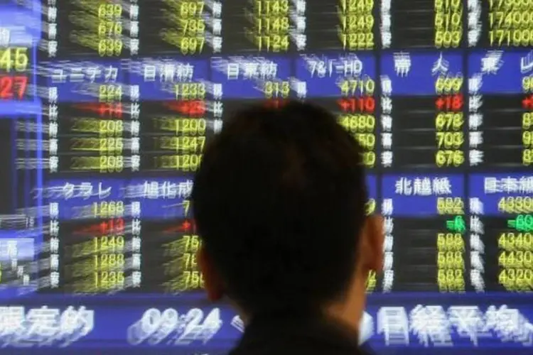 
	&Iacute;ndice Nikkei, da bolsa de valores de T&oacute;quio, no Jap&atilde;o: o &iacute;ndice teve a maior alta porcentual desde 2 de agosto, fechando com um avan&ccedil;o de 3,0%
 (Getty Images)