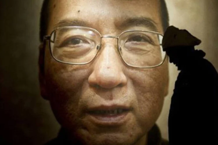 Dois dias antes do Prêmio Nobel da Paz desse ano ser entregue em Oslo, Shirin Ebadi, Jody Williams, Mairead Maguire, Betty Williams e Desmond Tutu inauguraram o Comitê Internacional de Apoio a Liu Xiaobo (Odd Andersen/AFP)