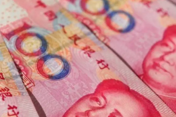 Diversos países e entidades financeiras defenderam uma valorização do iuane (AFP/Frederic J. Brown)