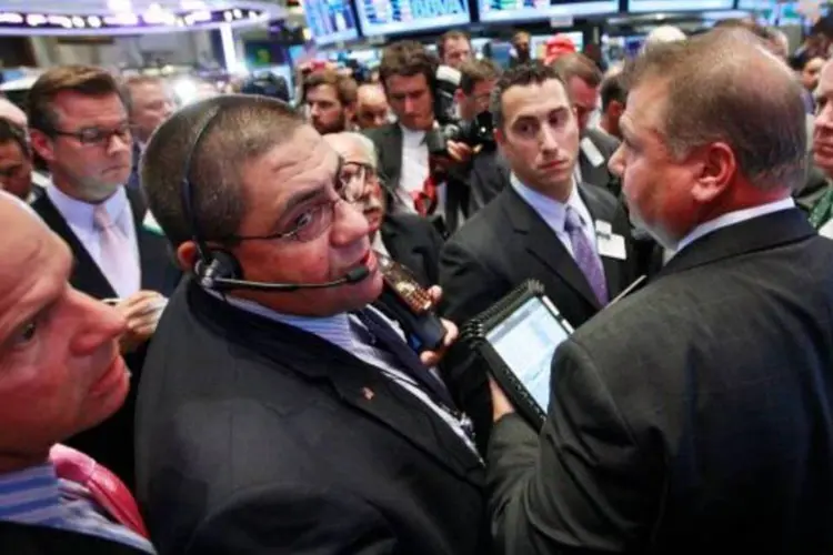 Operadores da New York Stock Exchange, a NYSE (Brendan McDermid/Reuters)