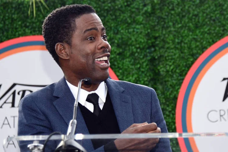 
	O comediante e ator Chris Rock: &quot;Comediante, ator, roteirista, produtor, diretor, documentarista...Fez de tudo. Vai ser um mestre de cerim&ocirc;nias fenomenal&quot;
 (Getty Images / Michael Buckner)