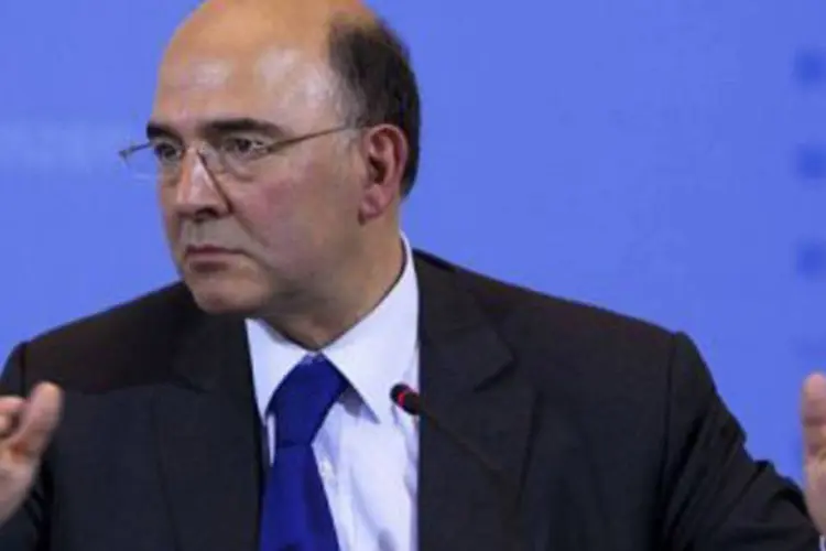 O ministro das Finanças da França, Pierre Moscovici: questionado uma segunda vez pelos jornalistas, ele brincou: ''responderei como o senhor De Guindos'' (David Gannon/AFP)