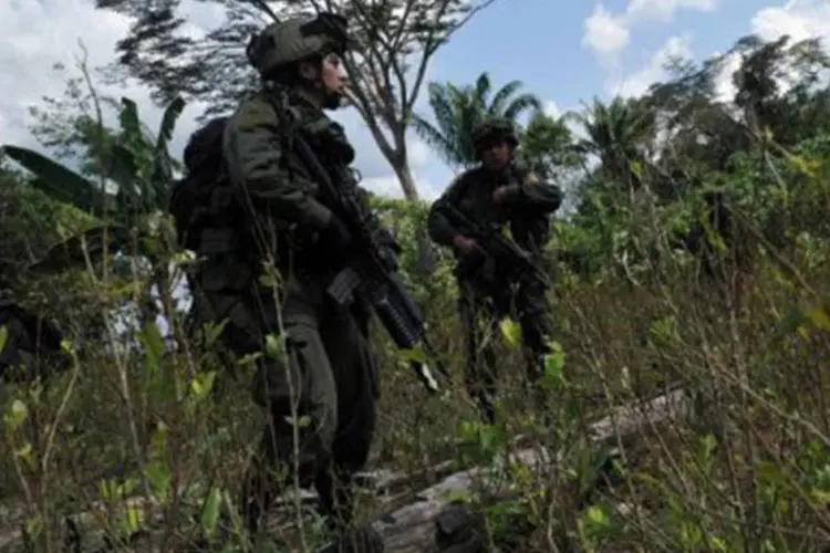 O policiais foram mortos em uma área de cultivo de coca (Guillermo Legaria/AFP)
