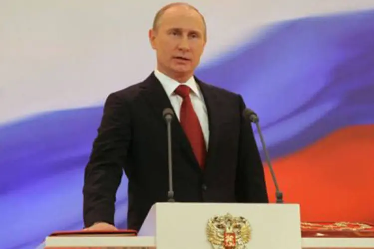 Putin: "o sentido de toda minha vida e meu dever é o serviço à Pátria, a nosso povo, cujo apoio me inspirou e ajudou na tomada das decisões mais difíceis e complexas" (Ria-Novosti/Kremlin/ Vladimir Rodionov/AFP)