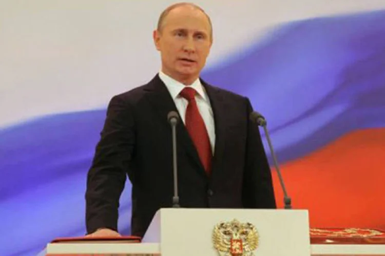 
	Vladimir Putin: &#39;&#39;Fa&ccedil;o aqui uma repreens&atilde;o aos diretores das empresas e quero ressaltar que s&atilde;o elas e n&atilde;o o Estado que contratam os jogadores&#39;&#39;
 (Ria-Novosti/Kremlin/ Vladimir Rodionov/AFP)