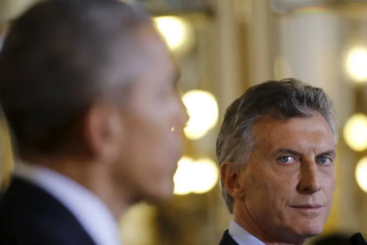 
	Obama e Macri: Macri viajou at&eacute; essa regi&atilde;o para acompanhar o presidente dos Estados Unidos, Barack Obama, que, ap&oacute;s a visita oficial a Buenos Aires na semana passada, passou uma dia de descanso em R&iacute;o Negro
 (Carlos Barria/Reuters)