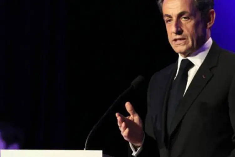 
	Sarkozy: &quot;N&atilde;o houve indiciamento&quot;, destacou o advogado, que estava com o ex-presidente na sa&iacute;da do Pal&aacute;cio da Justi&ccedil;a
 (Kenzo Tribouillard/AFP)