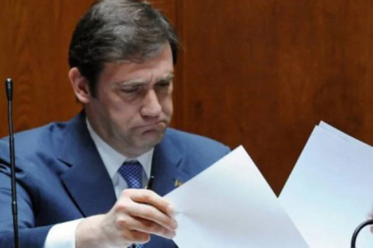 
	O primeiro-ministro portugu&ecirc;s, Pedro Passos Coelho:&nbsp;a mo&ccedil;&atilde;o de censura dos socialistas foi tachada de&nbsp;&quot;irrespons&aacute;vel&quot;&nbsp;pelos partidos no Governo, que acusam a oposi&ccedil;&atilde;o de fazer um grande preju&iacute;zo ao pa&iacute;s.
 (Francisco Leong/AFP)