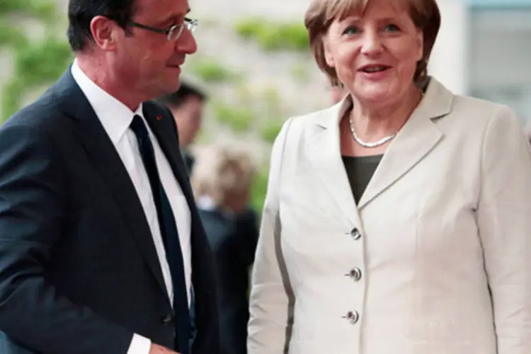
	A chanceler da Alemanha, Angela Merkel, vai se reunir com o presidente da Fran&ccedil;a, Fran&ccedil;ois Hollande, para um jantar de trabalho
 (Carsten Koall/ Getty Images)