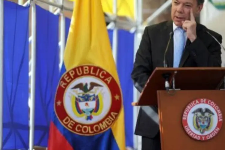 
	Juan Manuel Santos: Santos destacou o apoio de Hillary e de seu marido &agrave; paz atrav&eacute;s do Plano Col&ocirc;mbia
 (Raul Arboleda/AFP)