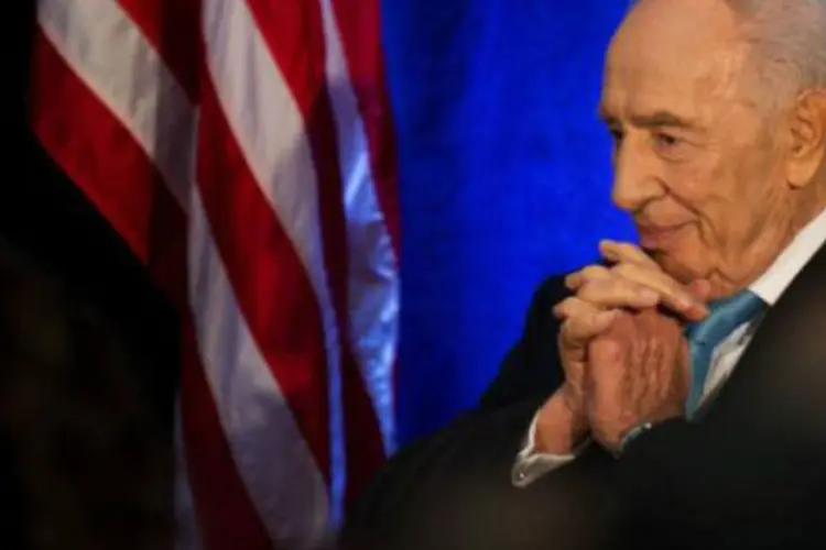 O presidente de Israel, Shimon Peres, recebe Medalha Presidencial da Liberdade em Washington (AFP)