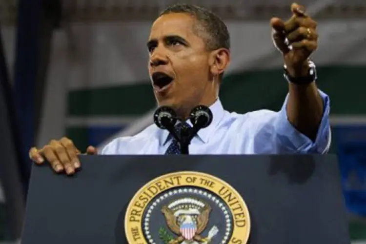 
	O presidente dos EUA, Barack Obama: por sua vez, Obama destacou suas conquistas em prol dos direitos da mulher
 (Jim Watson/AFP)