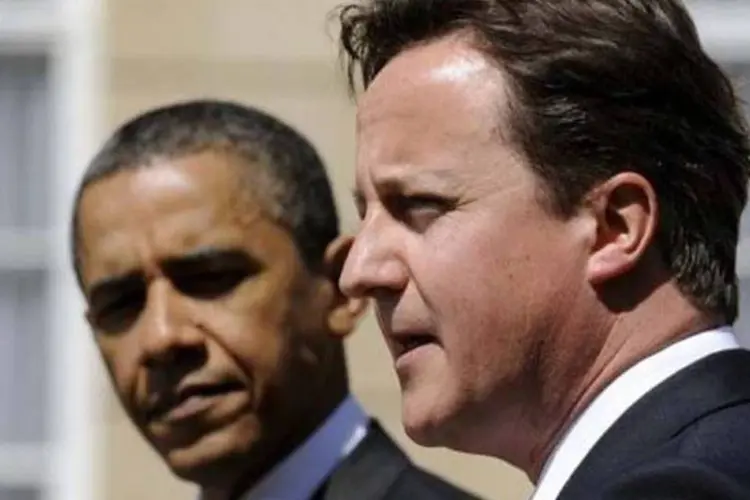 
	Obama e David Cameron: visita de Cameron acontece durante os dias 15 e 16 de janeiro
 (Getty Images)