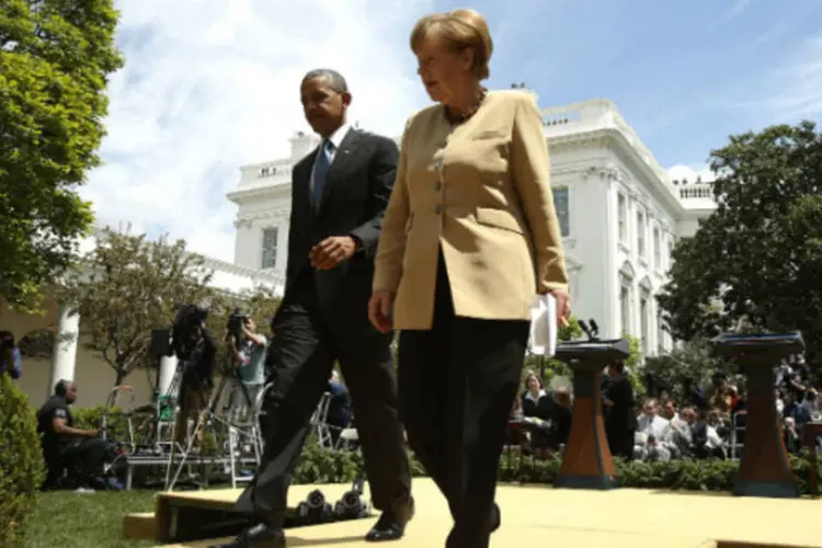 
	Obama e Merkel: ambos deixaram claro que pr&oacute;ximo passo ser&aacute; decretar san&ccedil;&otilde;es sobre setores separados da economia russa ou da &aacute;rea militar
 (Kevin Lamarque/Reuters)