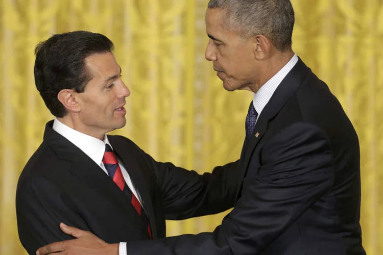 
	Obama e Pe&ntilde;a Nieto: os dois se reuniram na Casa Branca um dia depois do fim da Conven&ccedil;&atilde;o Nacional Republicana
 (Joshua Roberts / Reuters)