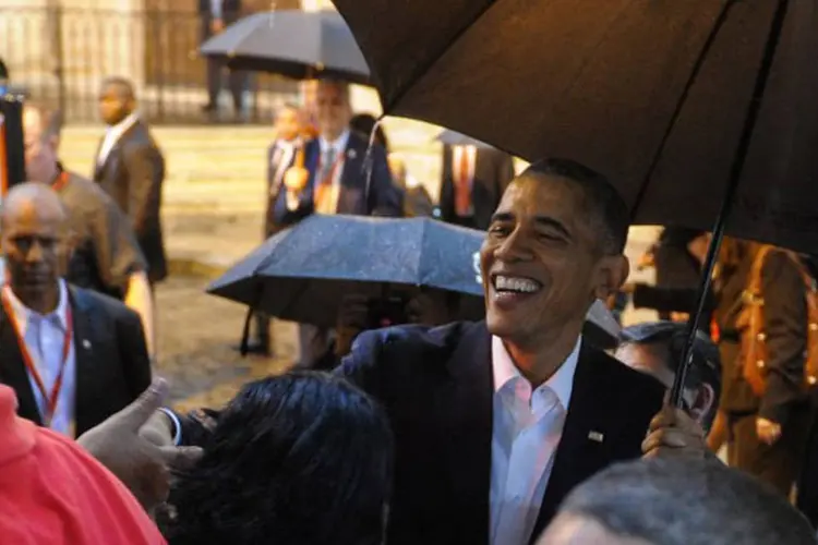 
	Barack Obama: &quot;Vai ocorrer uma mudan&ccedil;a aqui e acredito que Ra&uacute;l Castro entende isso&quot;, disse Obama
 (Yamil Lage/ AFP)