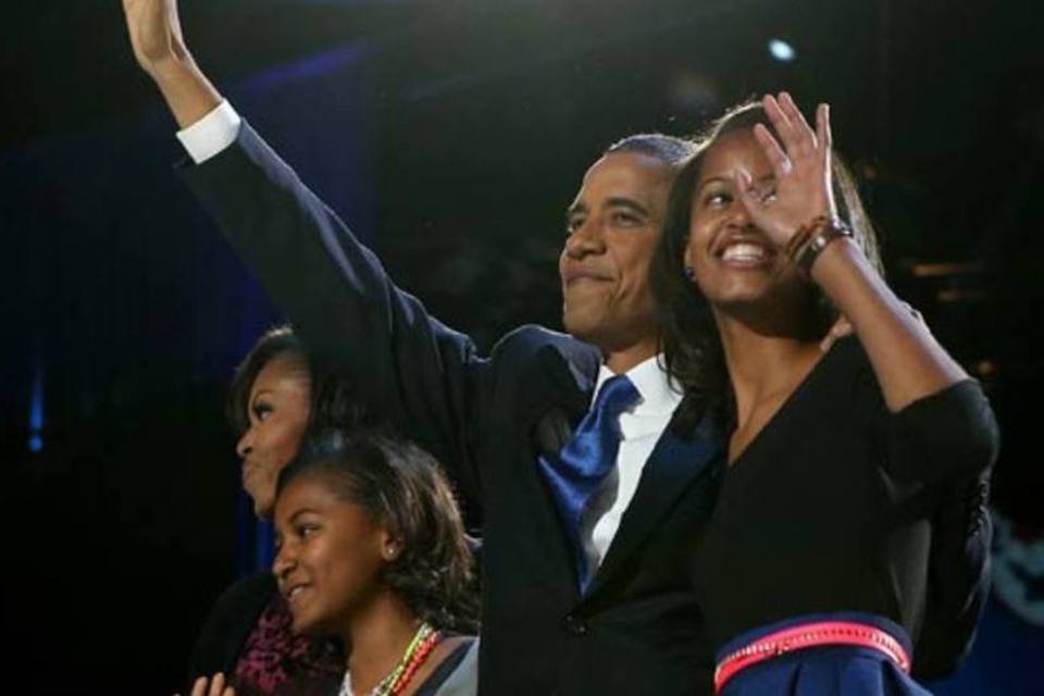 
	Obama comemora reelei&ccedil;&atilde;o com a fam&iacute;lia: o presidente americano afirmou que podia dan&ccedil;ar&nbsp;&quot;em privado&quot;&nbsp;com sua esposa, a primeira-dama, Michelle Obama (Getty Images)