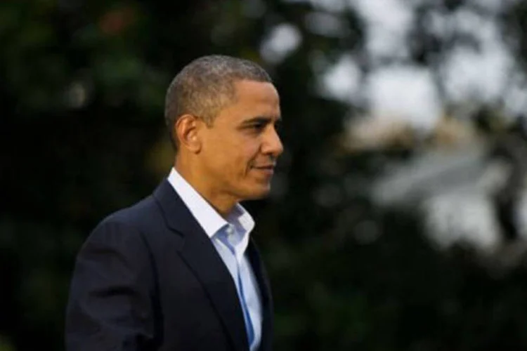 
	Barack Obama : segundo porta-voz do governo, o presidente americano retornar&aacute; &agrave; Casa Branca para monitorar preparativos e a resposta ao furac&atilde;o
 (Nicholas Kamm/AFP)