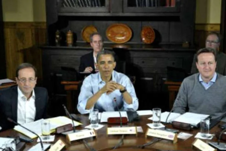 Obama concede uma coletiva entre o presidente francês, François Hollande, e o premier britânico, David Cameron (Mandel Ngan/AFP)