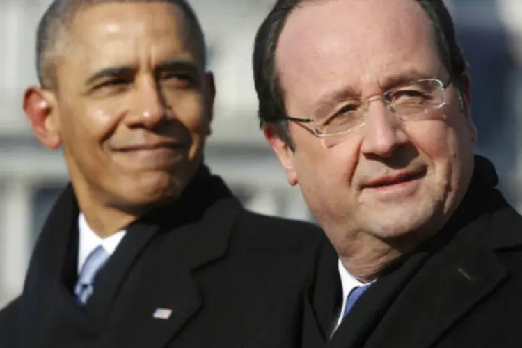 
	Barack Obama (E) e Fran&ccedil;ois Hollande: &quot;mais pa&iacute;ses devem intensificar e cumprir responsabilidades de lideran&ccedil;a, e &eacute; isso o que EUA e Fran&ccedil;a est&atilde;o fazendo&quot;, declarou Obama
 (Jonathan Ernst/Reuters)