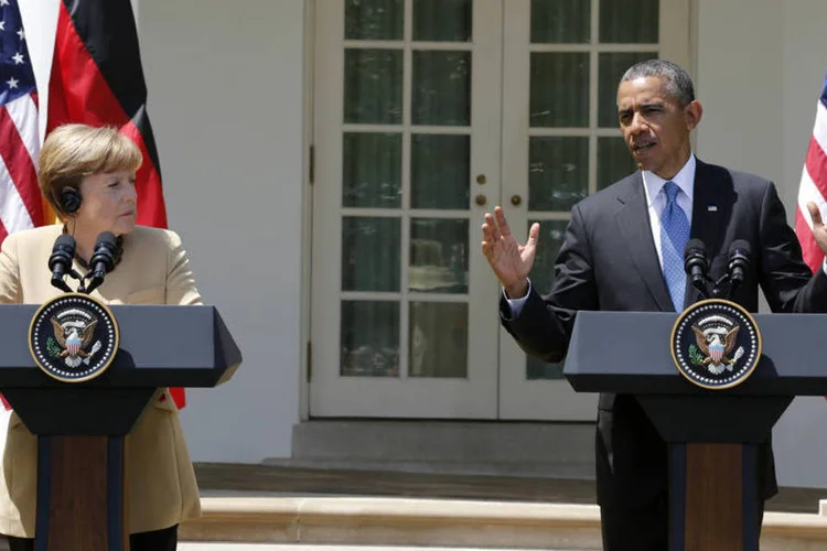 Barack Obama e Angela Merkel: "se a Rússia perturbar as eleições deste mês, coordenaremos rapidamente passos adicionais, incluindo mais sanções", disse Obama (Larry Downing/Reuters)
