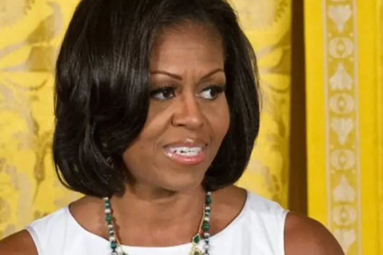 
	A primeira-dama dos Estados Unidos, Michelle Obama: &quot;estou ansiosa para encontrar com as fam&iacute;lias e prestar qualquer apoio que puder apresentar&quot;, declarou
 (Nicholas Kamm/AFP)