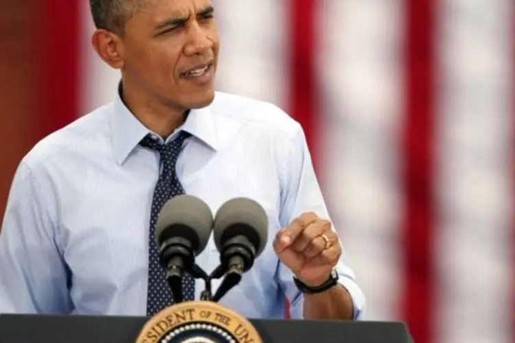 
	Para Obama, que se declara crist&atilde;o, sua f&eacute; o faz consciente de que &eacute; &quot;amado&quot; por Deus
 (Joe Raedle/Getty Images)