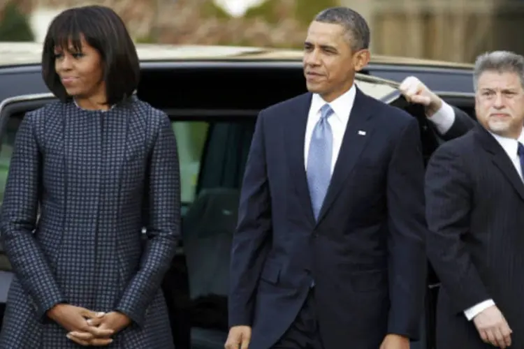 
	Barack Obama, e a primeira-dama Michelle Obama: Obama foi reeleito no dia 6 de novembro do ano passado, com 303 dos 538 votos do col&eacute;gio eleitoral.
 (REUTERS / Joe Skipper)