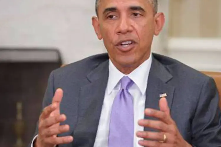 
	Barack Obama: &quot;agora &eacute; tempo de curar. Agora &eacute; tempo para a paz e a calma nas ruas de Ferguson&quot;
 (Mandel Ngan/AFP)