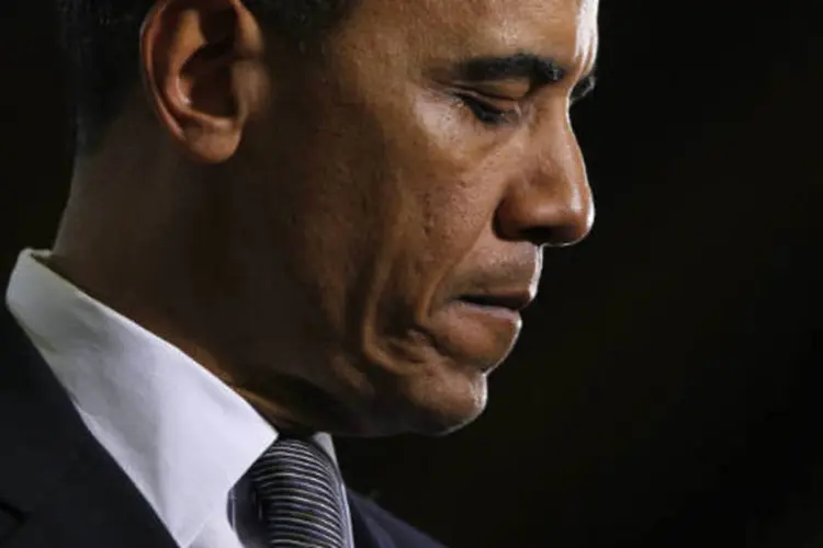Obama: "precisamos de uma votação", gritou emocionado o presidente norte-americano. (REUTERS/Jason Reed)
