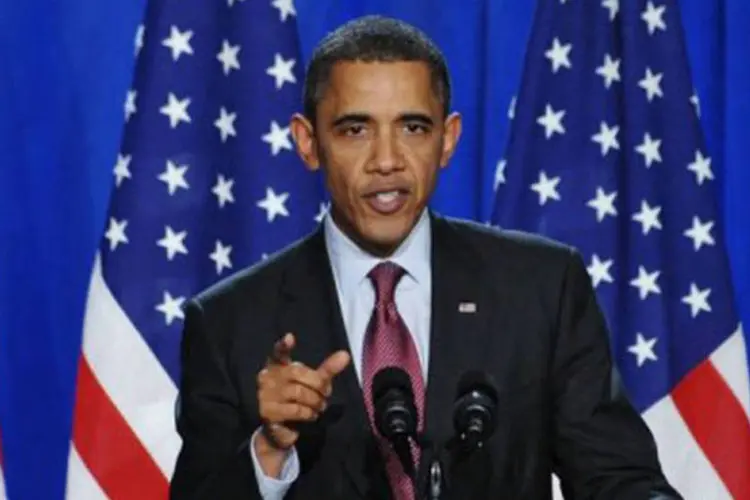 Obama pediu aos republicanos que não ajam como o "Grinch", o personagem que detesta o espírito de Natal
 (Mandel Ngan/AFP)