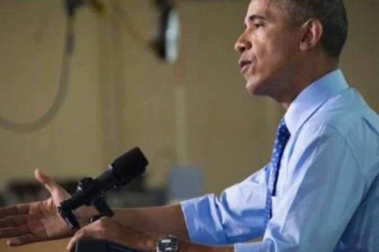 
	Obama: governo federal lan&ccedil;ou programa para incentivar ag&ecirc;ncias federais, instala&ccedil;&otilde;es militares e edif&iacute;cios que recebem subs&iacute;dios p&uacute;blicos na regi&atilde;o de Washington a instalarem mais pain&eacute;is solares
 (AFP)