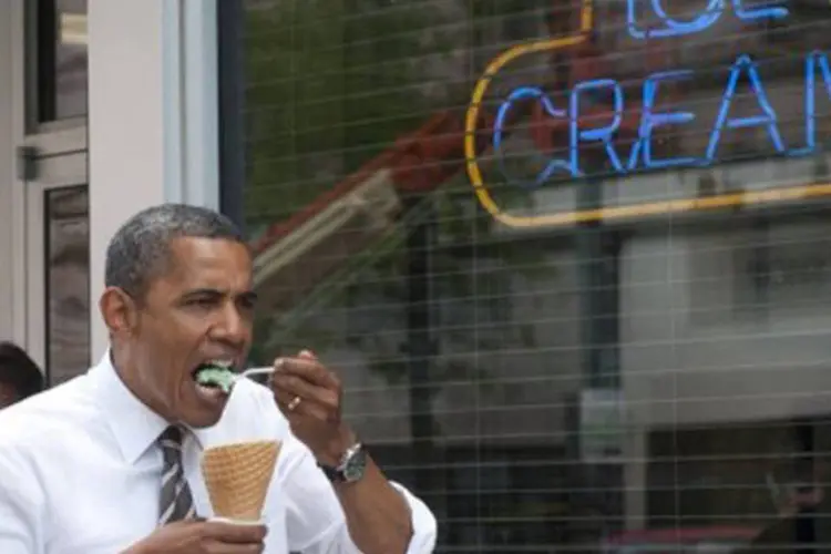 Obama toma sorvete: Obama advertiu que os progressos ainda são insuficientes (©AFP / Saul Loeb)