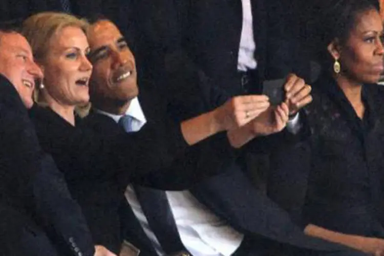 
	Halle Thorning-Schimdt e Barack Obama: &quot;Isso mostra que os chefes de Estado e de governo s&atilde;o pessoas que se divertem juntas quando se encontram&quot;, disse ministra
 (AFP)