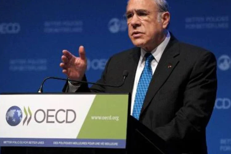 O secretário geral da Organização para Cooperação e Desenvolvimento Econômico (OCDE) é visto durante conferência da organização em Paris (Eric Piermont/AFP/AFP)
