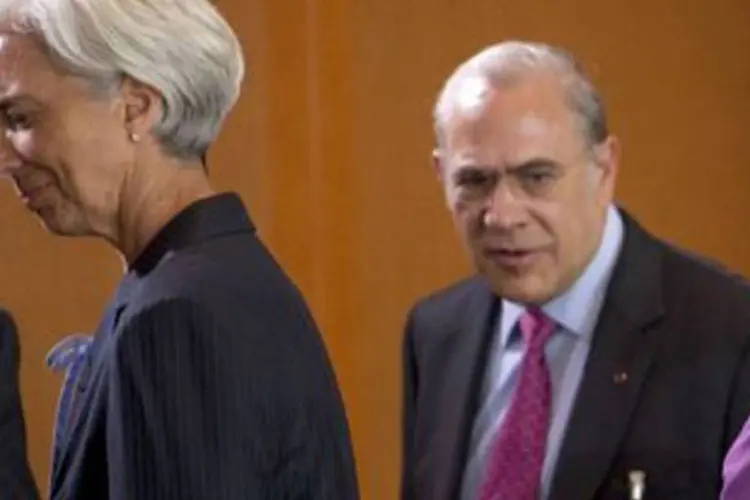 Diretor da OCDE, Angel Gurria, e a diretora do FMI, Christine Lagarde (Johannes Eisele/AFP)