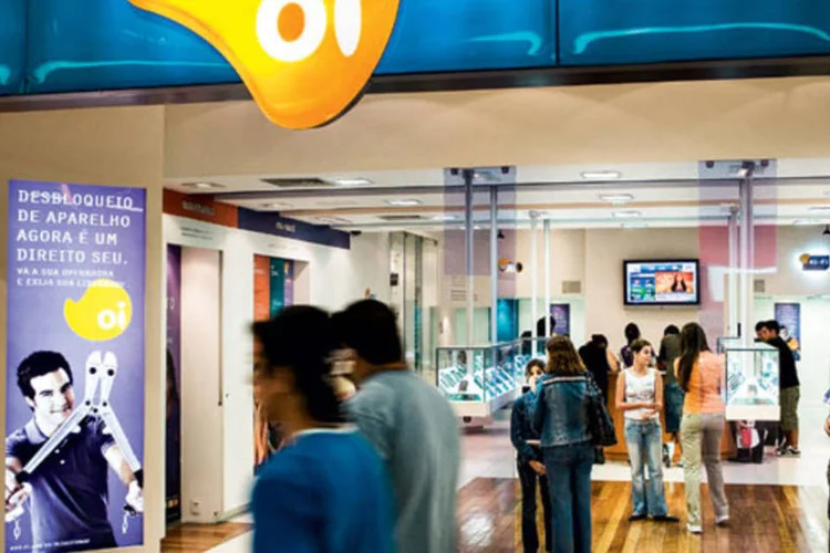 
	Oi assina acordo preliminar com Portugal Telecom
 (Marcelo Correa / EXAME)