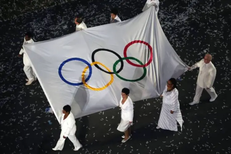 
	Marina Silva carrega bandeira nas Olimp&iacute;adas: APO&nbsp;&eacute; cons&oacute;rcio que coordena atua&ccedil;&otilde;es de governos na prepara&ccedil;&atilde;o do pa&iacute;s para Jogos Ol&iacute;mpicos e Paral&iacute;mpicos
 (Getty Images)