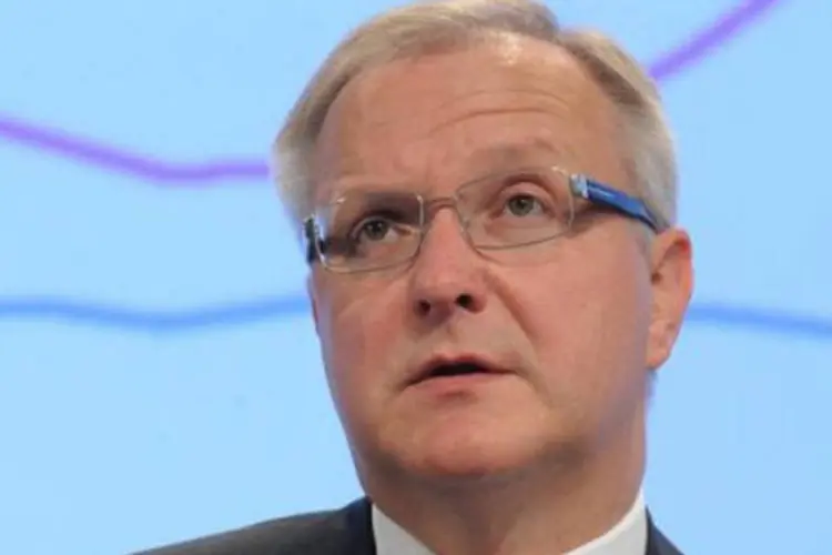 
	O comiss&aacute;rio europeu para Assuntos Monet&aacute;rios, Olli Rehn: ele disse que a Fran&ccedil;a chegar&aacute; a um d&eacute;ficit de 3,9% do PIB neste ano
 (John Thys/AFP)