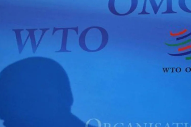 
	Cartaz da OMC em sua sede, na cidade de Genebra: a OMC previu que a expans&atilde;o &quot;seguir&aacute; sendo lenta&quot; em 2013, em torno de 3,3%
 (AFP)