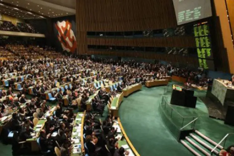 
	Membros da ONU aplaudem ap&oacute;s a aprova&ccedil;&atilde;o do status palestino: entre 14 e 21 de novembro, as hostilidades custaram as vidas de 174 palestinos e seis israelenses, na maioria civis
 (John Moore/Getty Images/AFP)
