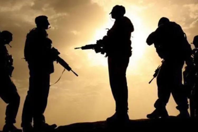 
	Soldados da Isaf patrulham &aacute;rea no sul do Afeganist&atilde;o: a For&ccedil;a Internacional de Assist&ecirc;ncia para a Seguran&ccedil;a da Otan no pa&iacute;s deve se retirar no final deste ano&nbsp;
 (John D McHugh/AFP)
