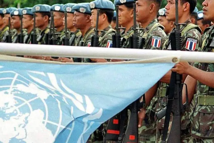 Soldados tailandeses da ONU participam de uma celebração em Los Polos, no Timor Leste (©afp.com / Antonio Dasiparu)