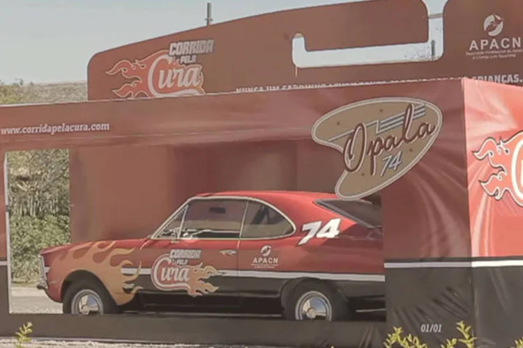 Opala em ação da "Hot Wheels" com crianças com câncer (Reprodução/YouTube)